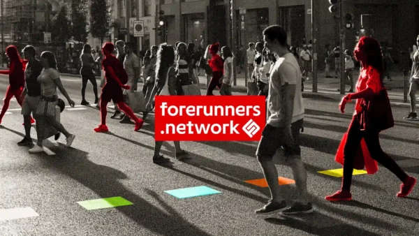 People walking in the streets, everything is black and white except a few dynamic figures are drenched in the scarlet red of forerunners network